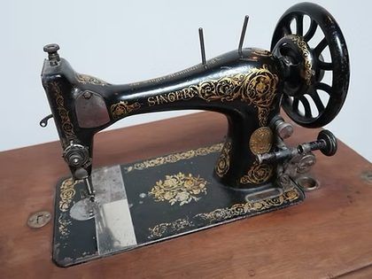 Machine à coudre Singer ancienne